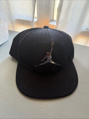 Jordan Black Snapback Hat with Metallic Jumpman Logo